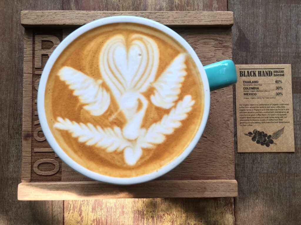 illustration d'un latte art dans une tasse de café